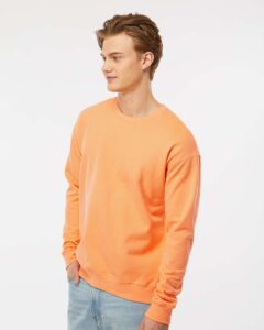 Tultex 340 Unisex Fleece Crewneck Sweatshirt – Cantaloupe (on model side)