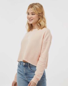 Independent Trading Co. AFX24CRP Women’s Lightweight Crop Crewneck Sweatshirt – Blush (on model side)