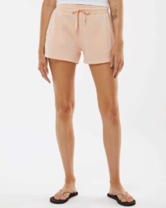 Independent Trading Co. PRM20SRT Women’s Lightweight California Wave Wash Fleece Shorts – Blush (on model)