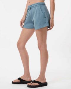 Independent Trading Co. PRM20SRT Women’s Lightweight California Wave Wash Fleece Shorts – Misty Blue (on model side)