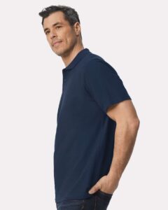 Gildan 64800 Unisex Softstyle® Pique Polo – Navy (on model side)