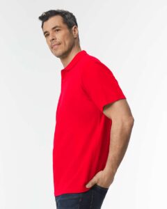 Gildan 64800 Unisex Softstyle® Pique Polo – Red (on model side)