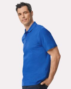 Gildan 64800 Unisex Softstyle® Pique Polo – Royal (on model side)