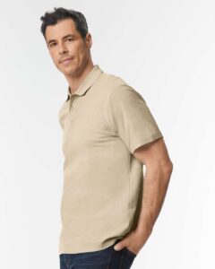 Gildan 64800 Unisex Softstyle® Pique Polo – Sand (on model side)