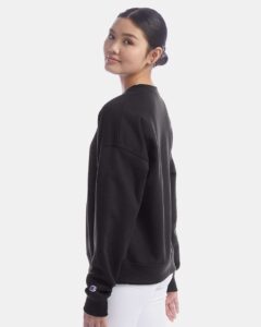 Champion SL650 Women’s Powerblend® Crewneck Sweatshirt – Black (on model side)