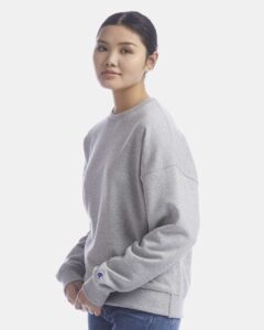 Champion SL650 Women’s Powerblend® Crewneck Sweatshirt – Light Steel (on model side)
