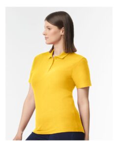 Gildan 64800L Women’s Softstyle® Pique Polo – Daisy (on model side)