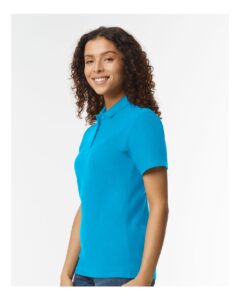 Gildan 64800L Women’s Softstyle® Pique Polo – Sapphire (on model side)