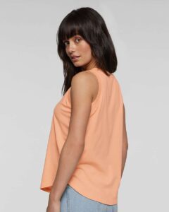 LAT 3592 Women’s Relaxed Fine Jersey Tank – Peachy (on model side)