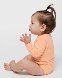Rabbit Skins 4421 Infant Fine Jersey Long Sleeve Bodysuit – Peachy (on model side)