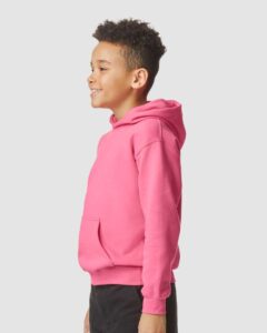 Gildan SF500B Youth Softstyle® Midweight Hooded Sweatshirt – Pink Lemonade (on model side)