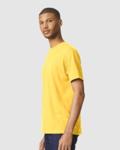 Gildan 64000CVC Unisex Softstyle® CVC T-Shirt – Daisy Mist (on model side)