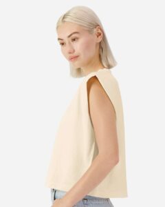 American Apparel 307GD Women’s Heavyweight Cotton Garment-Dyed Muscle Tee – Faded Cream (on model side)