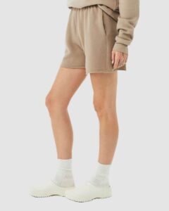 BELLA + CANVAS 3787 Women’s Cutoff Shorts – Tan (on model side)