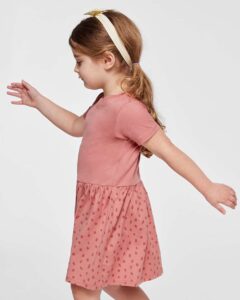 Rabbit Skins 5333 Toddler Fine Jersey Dress – Mauvelous/ Mauvelous Spot (on model side)