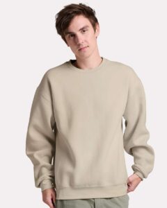 JERZEES C12MR Unisex Rugged Crewneck Sweatshirt – Putty (on model)