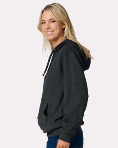 JERZEES IC49MR Unisex Ultimate CVC Hooded Sweatshirt – Black Ink Heather (on model side)