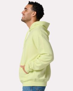 JERZEES IC49MR Unisex Ultimate CVC Hooded Sweatshirt – Celery Juice (on model side)