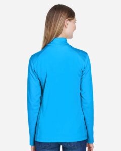 Devon & Jones DG479W Women’s DRYTEC20™ Performance Quarter-Zip Pullover – Ocean Blue/ Navy/ Ocean Blue (on model back)