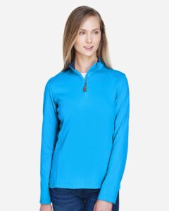 Devon & Jones DG479W Women’s DRYTEC20™ Performance Quarter-Zip Pullover – Ocean Blue/ Navy/ Ocean Blue (on model)