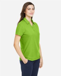 CORE365 CE112W Women’s Fusion ChromaSoft™ Pique Polo – Acid Green (on model side)