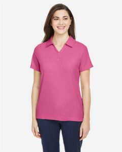CORE365 CE112W Women’s Fusion ChromaSoft™ Pique Polo – Charity Pink (on model)