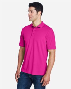 CORE365 88181 Men’s Origin Performance Piqué Polo – Bright Magenta (on model side)