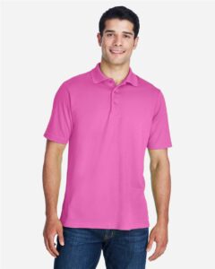 CORE365 88181 Men’s Origin Performance Piqué Polo – Charity Pink (on model)
