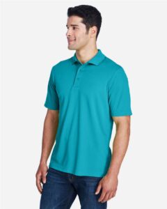 CORE365 88181 Men’s Origin Performance Piqué Polo – Clear Teal (on model side)