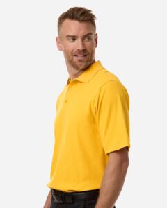 CORE365 CE106 Men’s Resolve CVC Performance Pique Polo – Campus Gold (on model side)