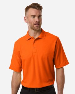 CORE365 CE106 Men’s Resolve CVC Performance Pique Polo – Campus Orange (on model)