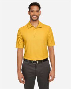 CORE365 CE112 Men’s Fusion ChromaSoft™ Pique Polo – Campus Gold (on model)
