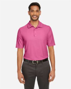 CORE365 CE112 Men’s Fusion ChromaSoft™ Pique Polo – Charity Pink (on model)