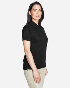 CORE365 78181 Women’s Origin Performance Piqué Polo – Black (on model side)