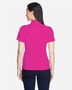 CORE365 78181 Women’s Origin Performance Piqué Polo – Bright Magenta (on model back)