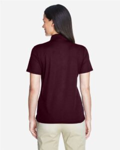 CORE365 78181 Women’s Origin Performance Piqué Polo – Burgundy (on model back)
