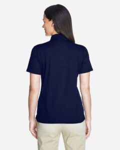 CORE365 78181 Women’s Origin Performance Piqué Polo – Classic Navy (on model back)
