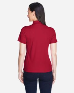 CORE365 78181 Women’s Origin Performance Piqué Polo – Classic Red (on model back)