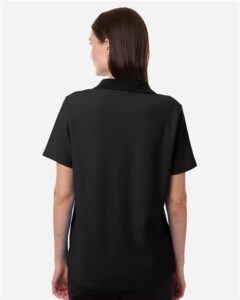 CORE365 CE106W Women’s Resolve CVC Performance Pique Polo – Black (on model back)