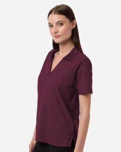 CORE365 CE106W Women’s Resolve CVC Performance Pique Polo – Burgundy (on model side)