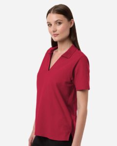 CORE365 CE106W Women’s Resolve CVC Performance Pique Polo – Classic Red (on model side)