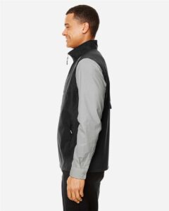 CORE365 CE703 Men’s Techno Lite Unlined Vest – Black (on model side)