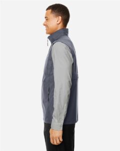 CORE365 CE703 Men’s Techno Lite Unlined Vest – Carbon (on model side)