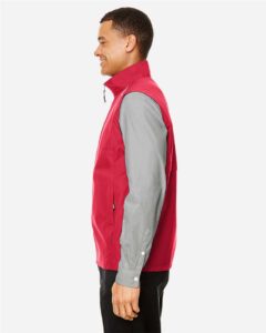 CORE365 CE703 Men’s Techno Lite Unlined Vest – Classic Red (on model side)