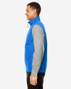 CORE365 CE703 Men’s Techno Lite Unlined Vest – True Royal (on model side)