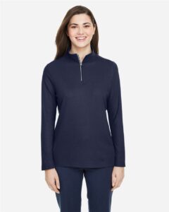 CORE365 CE405W Women’s Fusion ChromaSoft™ Pique Quarter-Zip Pullover – Classic Navy (on model)