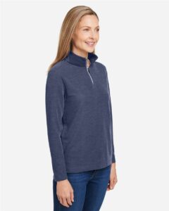 CORE365 CE405W Women’s Fusion ChromaSoft™ Pique Quarter-Zip Pullover – Classic Navy Heather (on model side)
