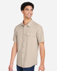 CORE365 CE510 Men’s Ultra UVP® Marina Shirt – Stone (on model side)