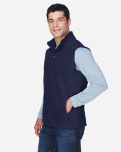 CORE365 88191 Men’s Journey Fleece Vest – Classic Navy (on model side)