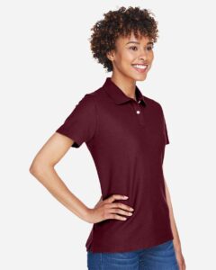 Devon & Jones DG150W Women’s DRYTEC20™ Performance Polo – Burgundy (on model side)